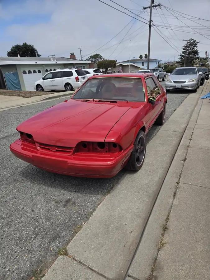 1990 Ford with fresh red paint